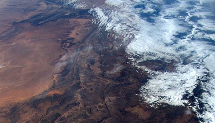 White clouds on brown rocks looks mesmerizing from space station! 