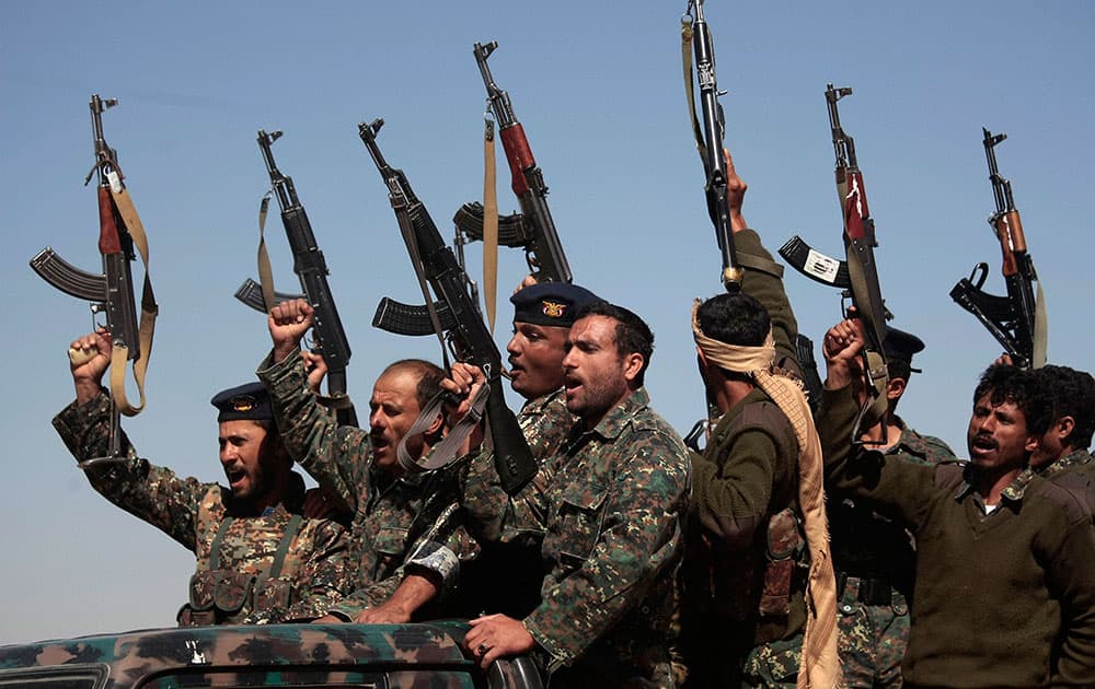 Newly recruited Shiite fighters, known as Houthis, chant slogans