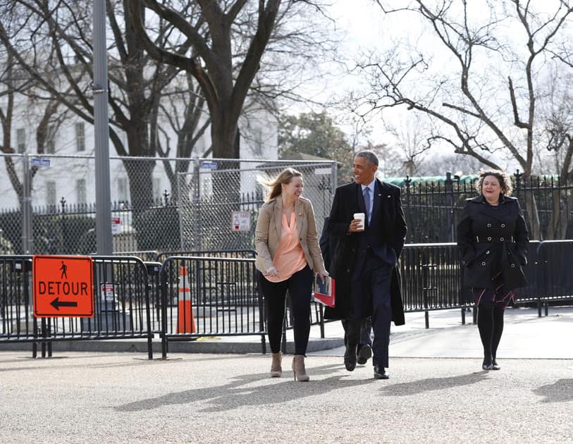 President Barack Obama walks out of the White House