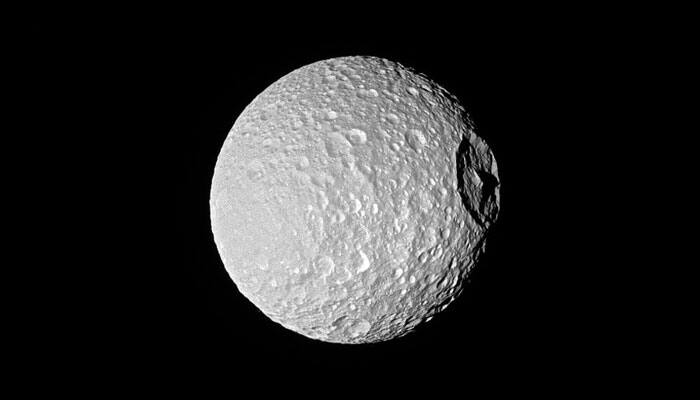Saturn&#039;s moon Mimas&#039; &#039;Mount Everest&#039; stands tall in Cassini&#039;s latest image!