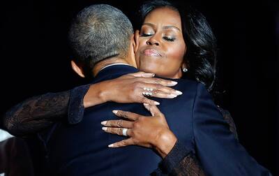 Michelle Obama hugs Barack Obama