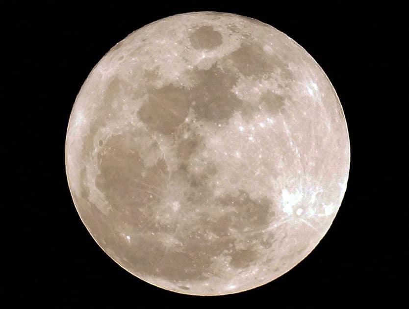 Full moon is seen over the sky of New Delhi