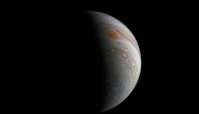 NASA&#039;s Juno camera captures this striking image of &#039;crescent Jupiter with the iconic Great Red Spot&#039; – A must-see photo!