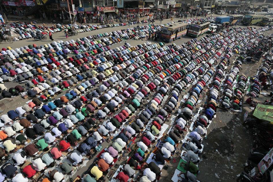 Bangladeshi Muslim devotees offer prayers