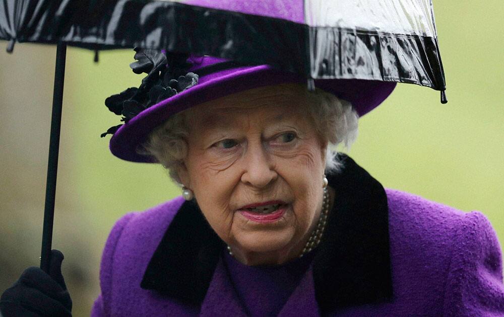 Queen Elizabeth II arrives to attend a church service at Flitcham church