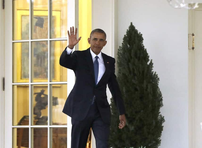 President Barack Obama waves as he leaves