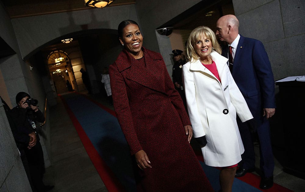 First lady Michelle Obama and Jill Biden arrive