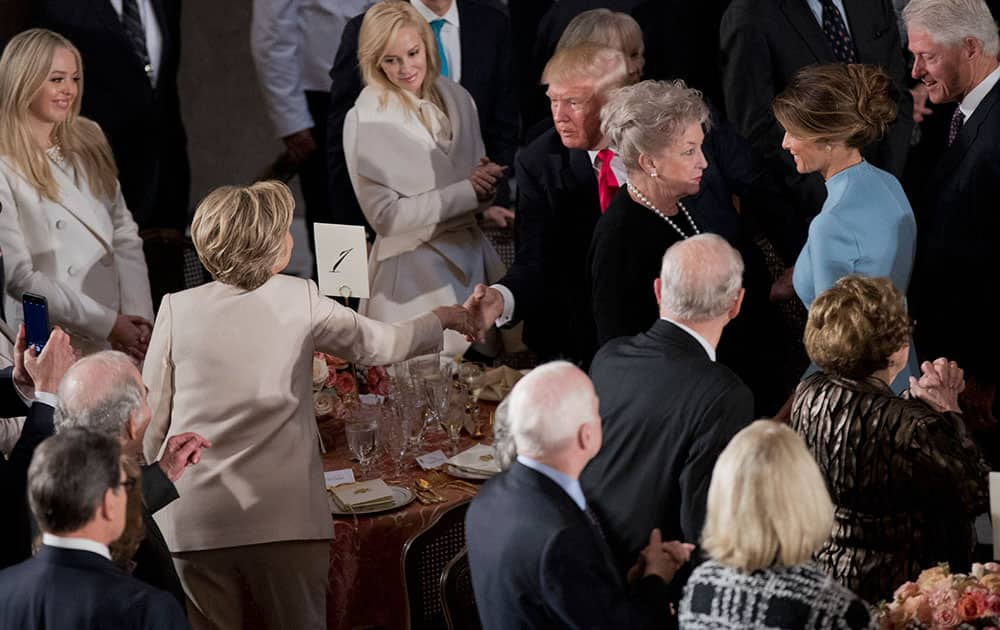 Newly sworn in President Donald Trump with his wife first lady Melania Trump