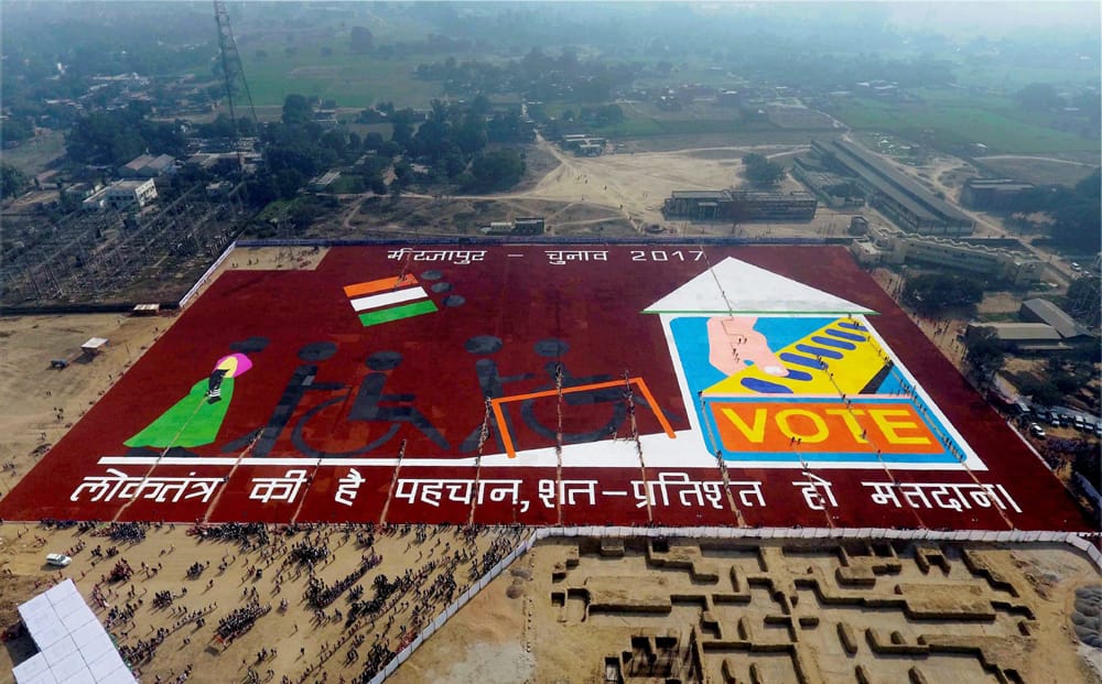 Children make a Rangoli on Voters Day