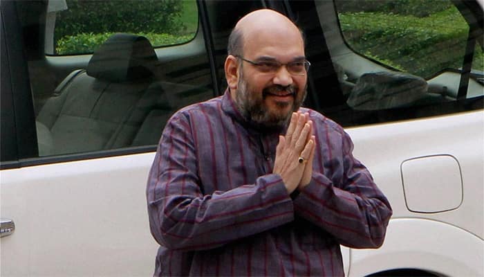 UP polls: Amit Shah releases BJP manifesto; promises free laptops with 1 GB data, anti-Romeo squads to check eve-teasing – See list here