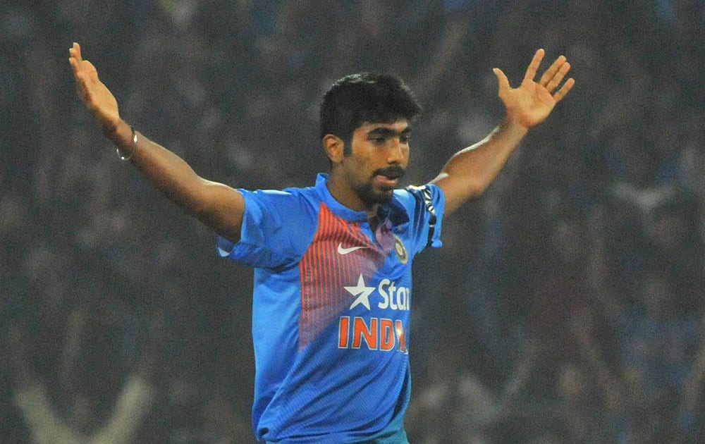 Jaspreet Bumrah celebrates after beating England