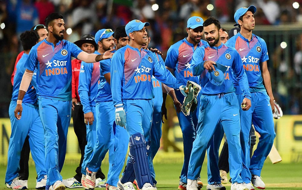 Virat Kohli with team mates celebrate the win over England during the 3rd T20 between India and England Virat Kohli with team mates celebrate the win over England during the 3rd T20 between India and England