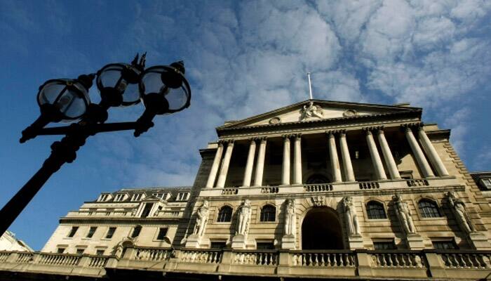 Bank of England hikes UK growth forecast; holds rate