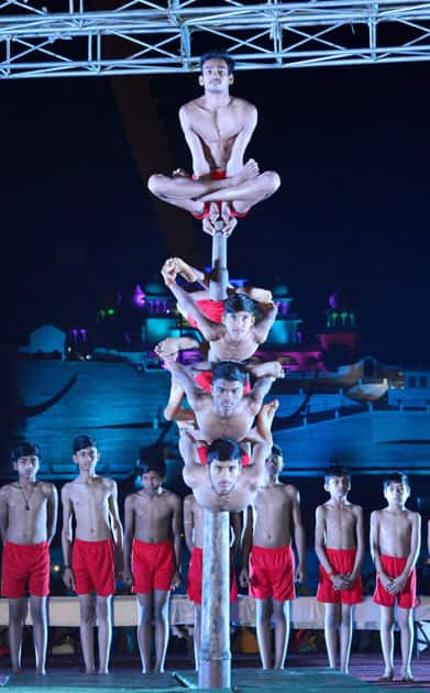 Gymnasts perform Mallakhamba