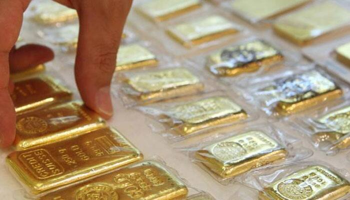 Gold bounces Rs 100 on positive global cues; jewellers&#039; demand