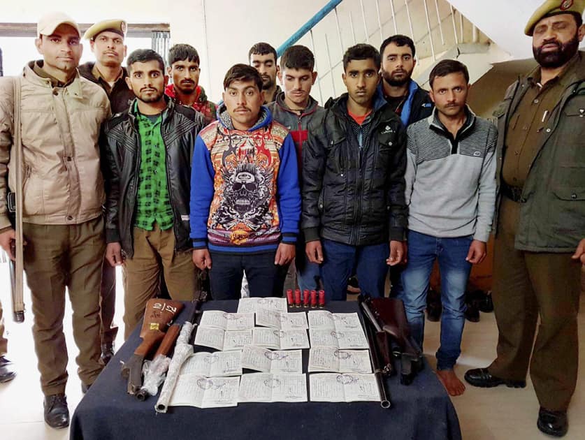 Nine booked for illegal possession of arms