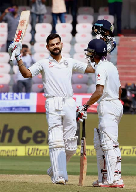 Virat Kohli celebrates his 200