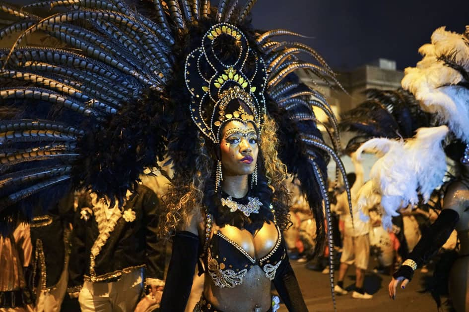  feathered dancer stands ready to perform