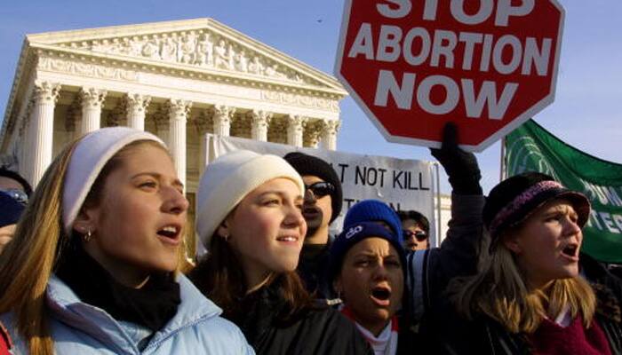 Abortion protests on both sides erupt across US