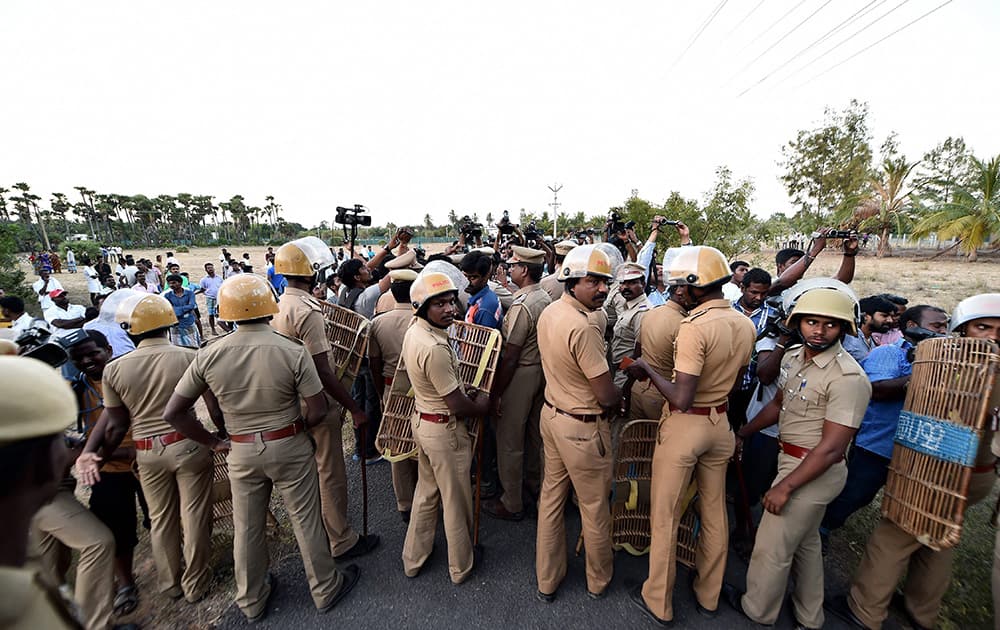 Police Personnel stands in front of the resort 