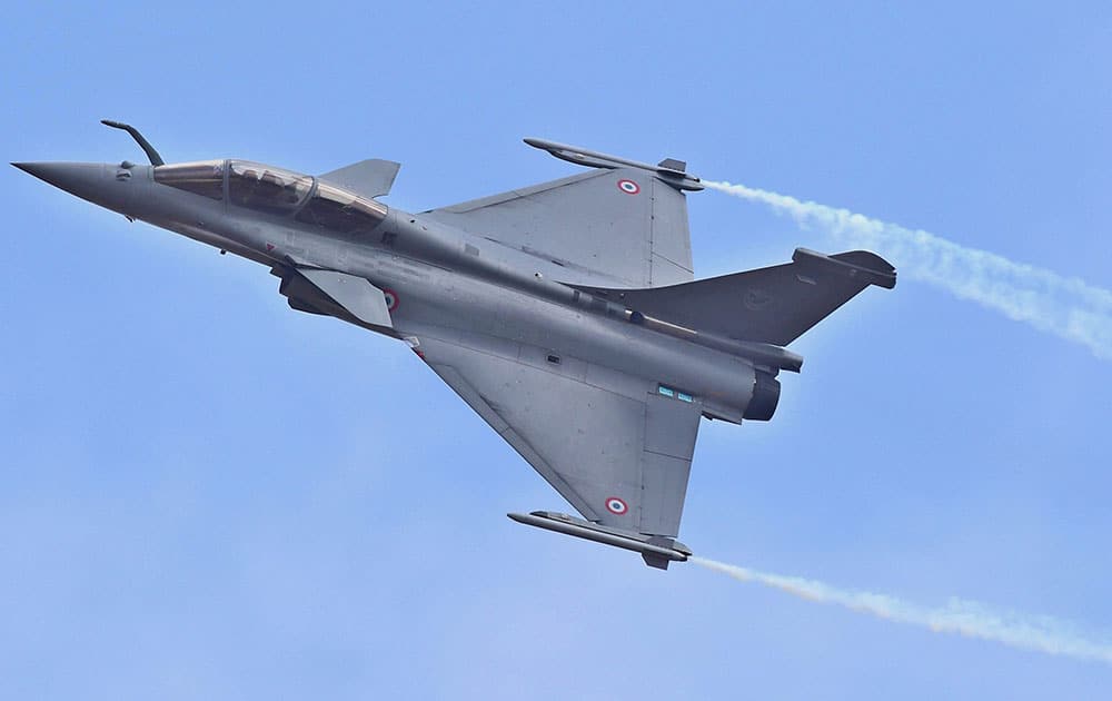 A Rafale fighter aircraft flys during the inauguration of the 11th biennial edition of AERO INDIA 2017