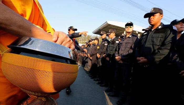 Thai authorities enter Buddhist temple to search for wanted monk - police