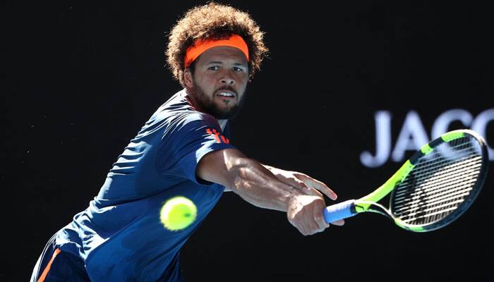 No coach, no problem as Jo-Wilfried Tsonga wins first career title at Rotterdam World Tennis tournament