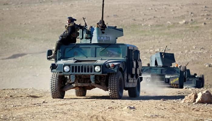 Iraqi forces battle their way toward Mosul airport