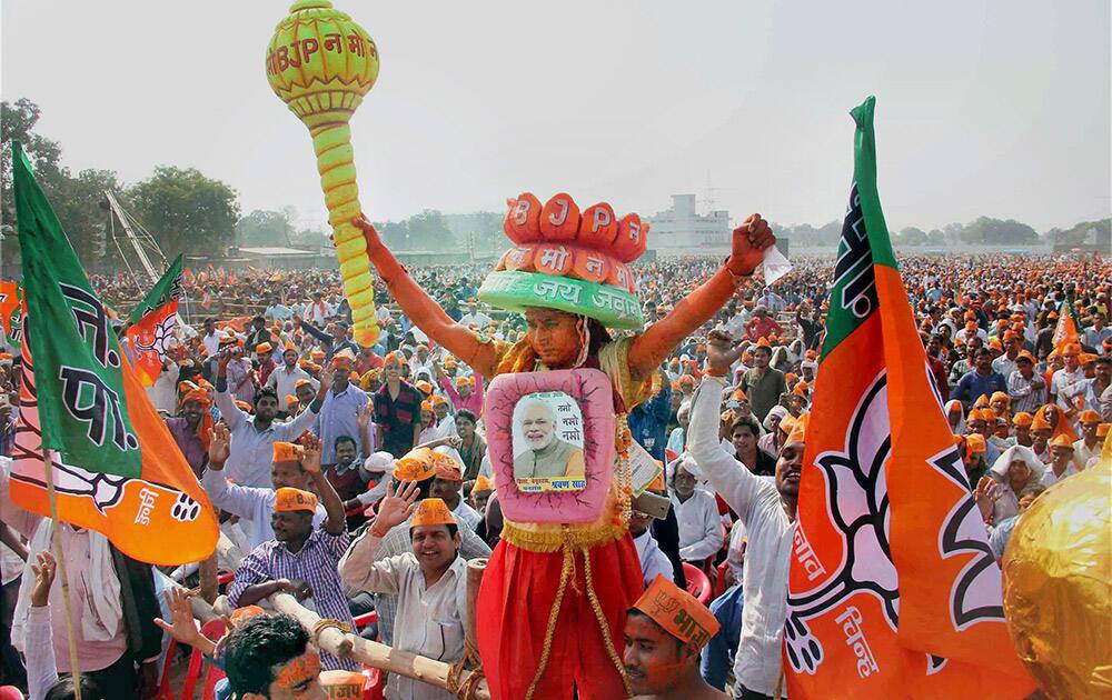 People throng the venue of Prime Minister Narendra Modi's Parivartan Sankalp rally at Phulpur in Uttar Pradesh