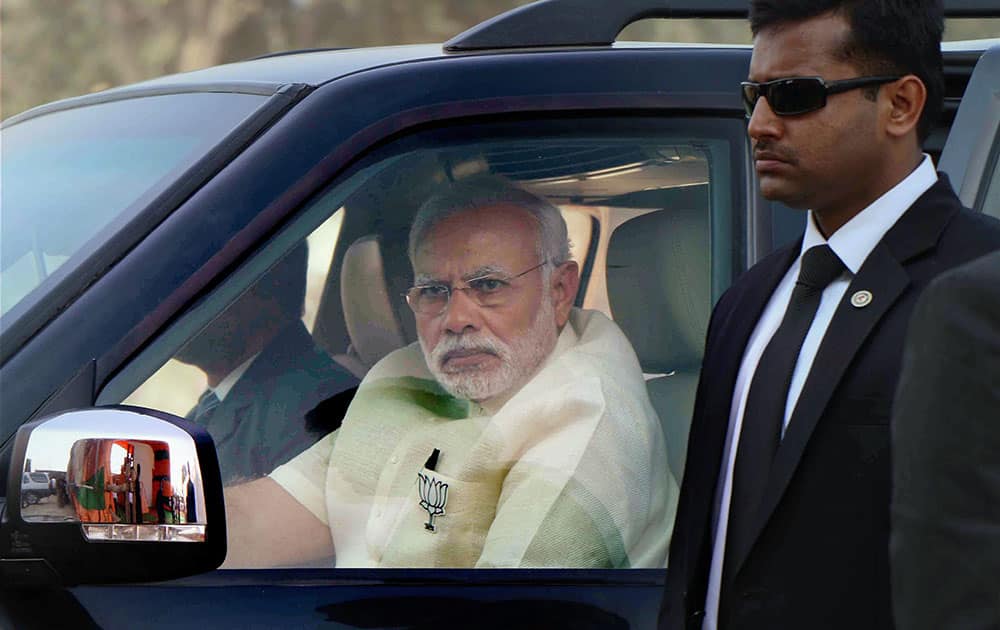 Prime Minister Narendra Modi arrives at an election rally in Phulpur, Uttar Pradesh