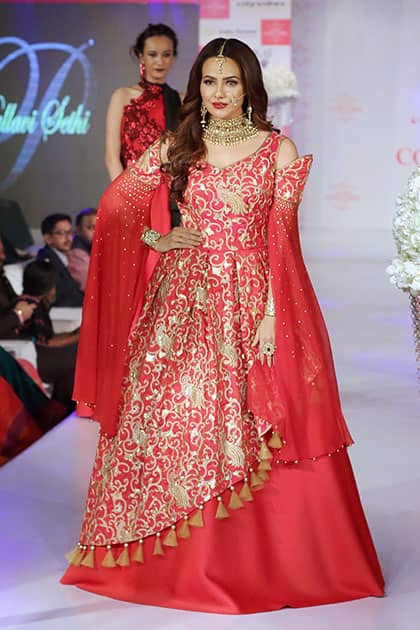 Actress Sana Khan walks the ramp during the Jaipur Couture Fashion Show