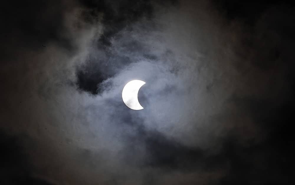 The moon passes in front of the sun, creating a solar eclipse visible in the southern hemisphere