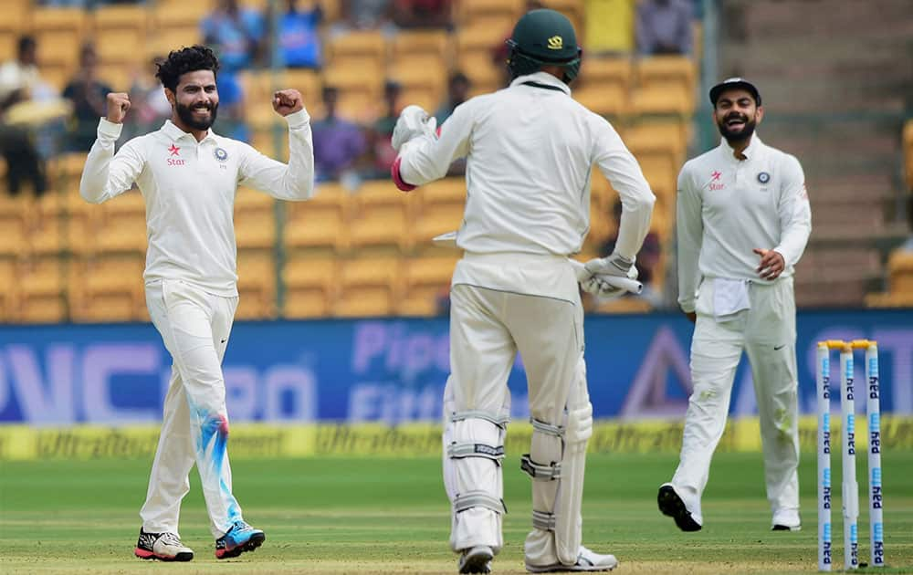 Ravindra Jadeja with team mates celebrate the wicket of Australias Nathan Lyon