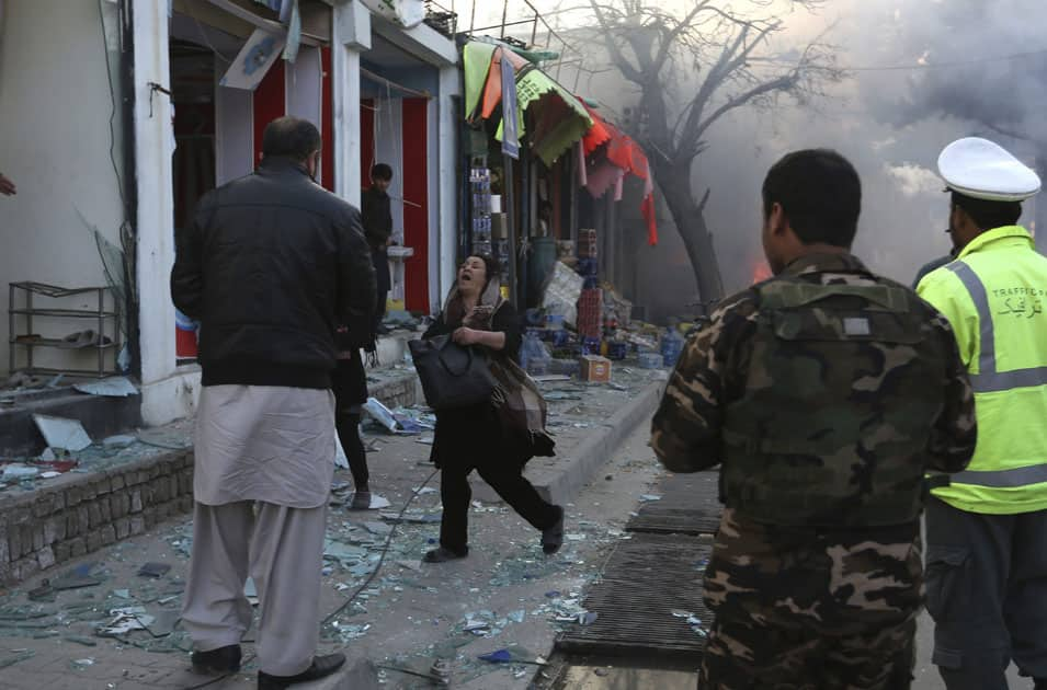 A woman cries after a suicide attack