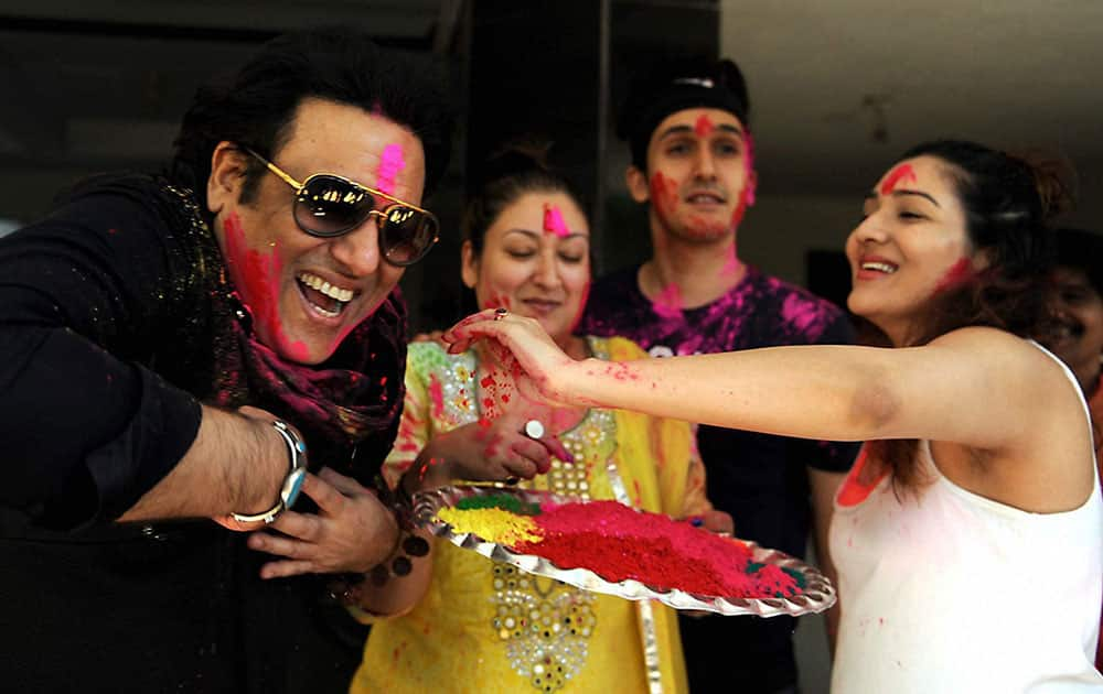 Actor Govinda celebrating Holi festival in Mumbai