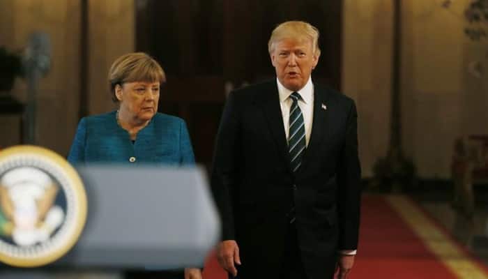 Donald Trump praises Angela Merkel on Germany&#039;s spending on defence, NATO