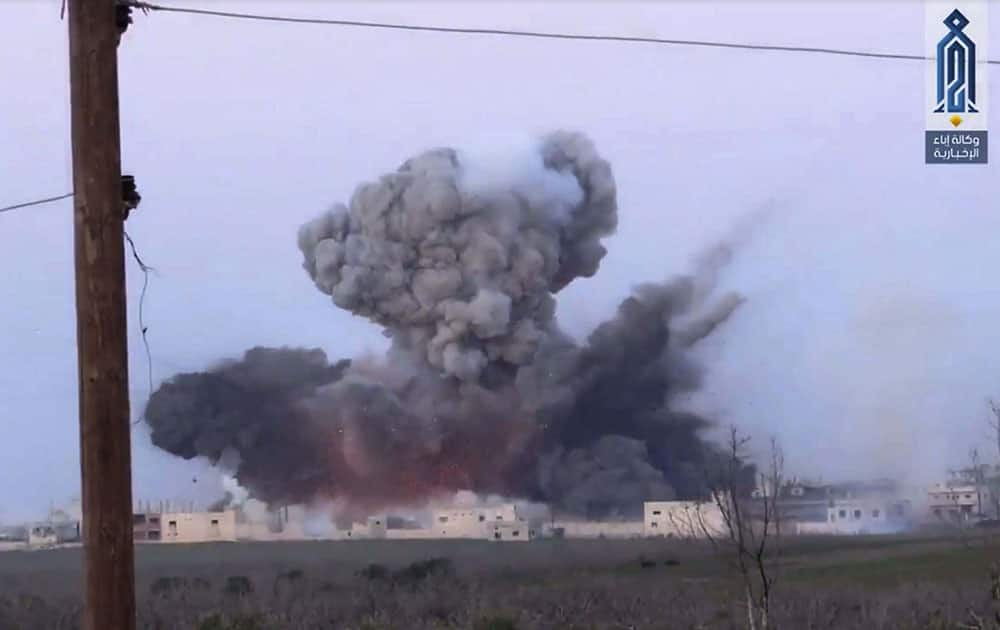 the communications arm shows black smoke rising after a suicide bomber 