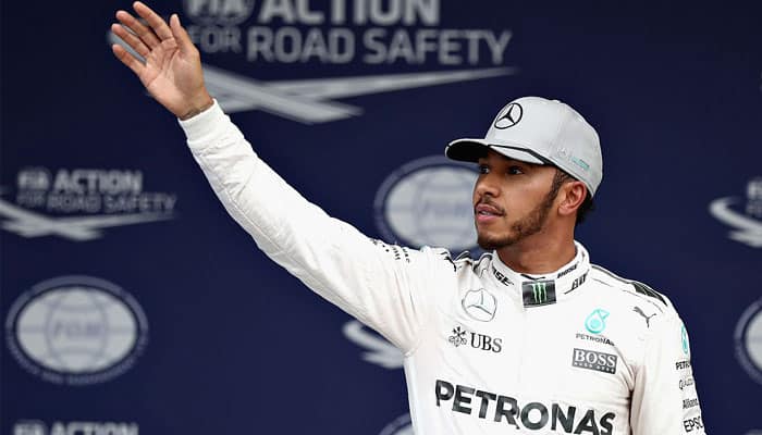 Australian Grand Prix: Lewis Hamilton on pole in season opener with record lap