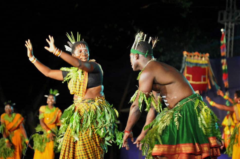 Folk artists perform