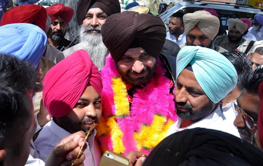 Punjab Minister Navjot Singh Sidhu during a meeting with Congress workers