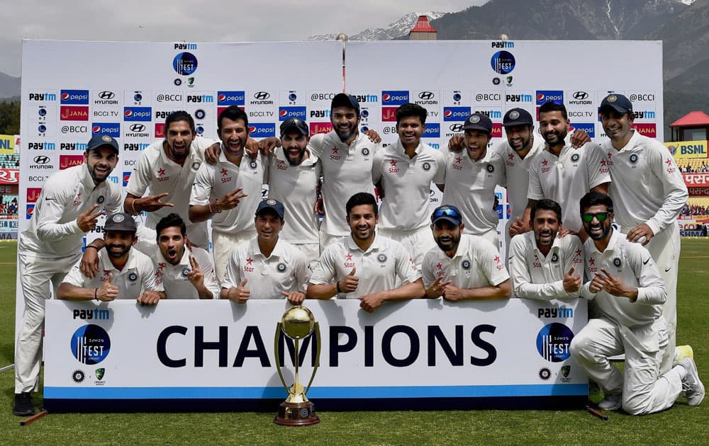 Indian team poses with the Border Gavaskar trophy after winning the series against Australia