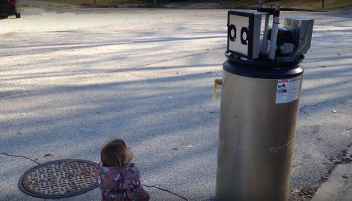 Viral Video — This tiny child meets abandoned water heater, mistakes it as robot