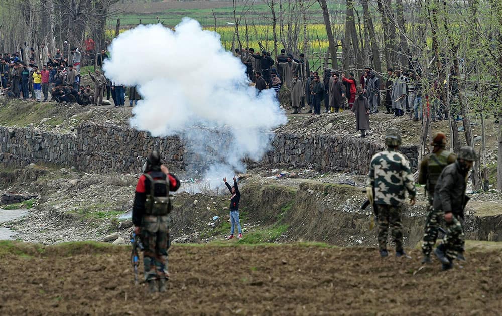 Locals clash with the security forces in Budgam