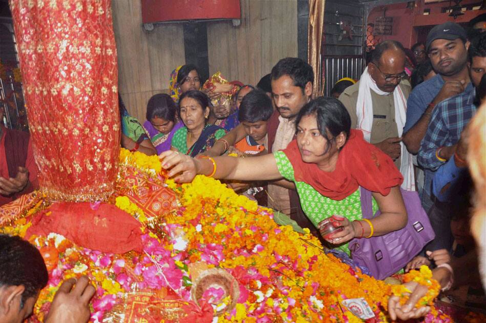 Devotees offer prayers at Alopi Devi Mandir