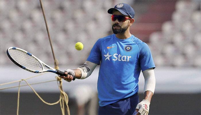 Recuperating Virat Kohli captured honing new skills — PHOTO