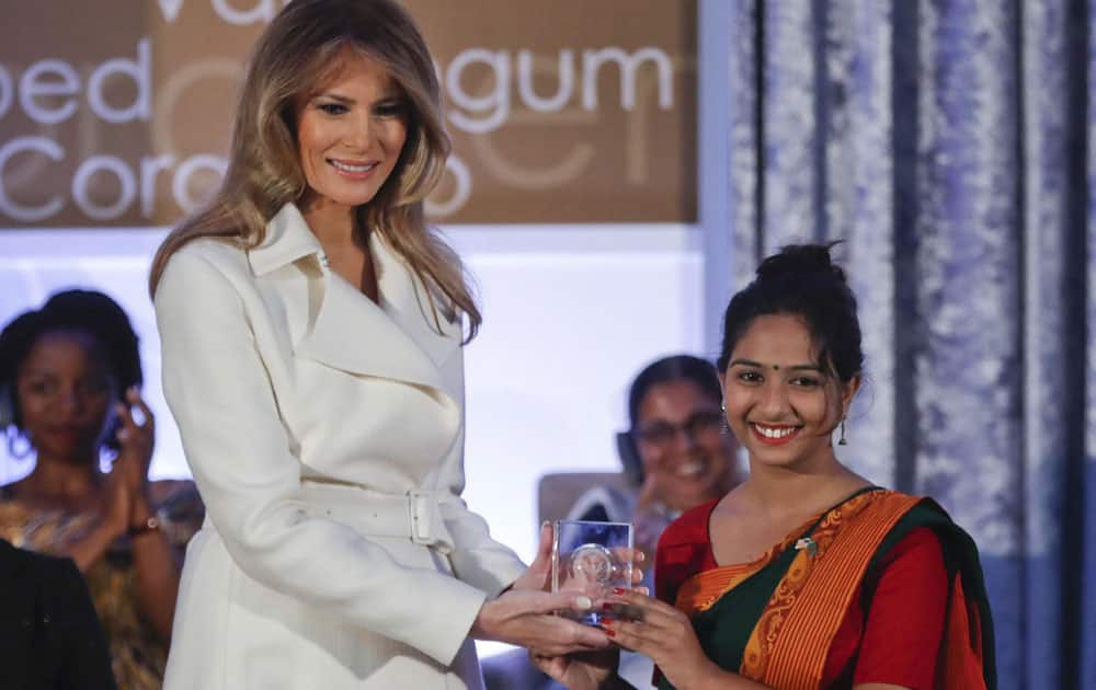 First lady Melania Trump presents the 2017 IWOC Award to Sharmin Akter