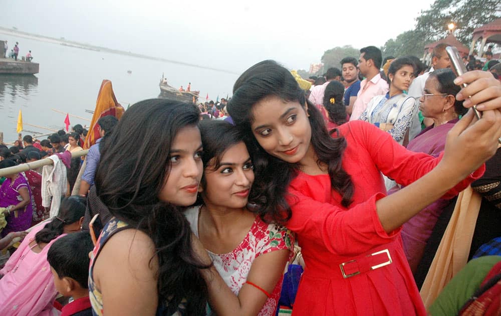 Girls click selfies during Chaiti Chhath celebrations