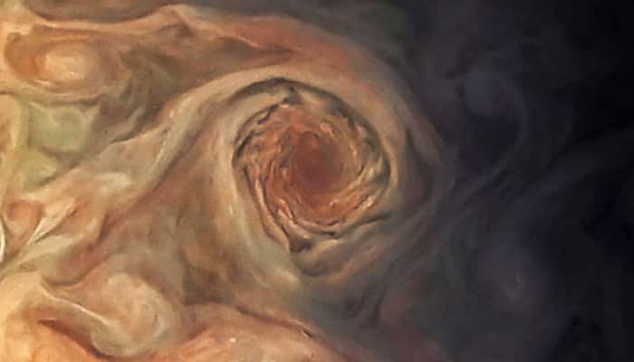 Jupiter&#039;s swirling ‘pearl’ storm as seen by Juno spacecraft – See pic