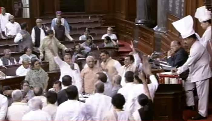 Huge uproar in Rajya Sabha over EVM tampering row; BJP slams Opposition, says go to EC, don&#039;t waste Parliament time