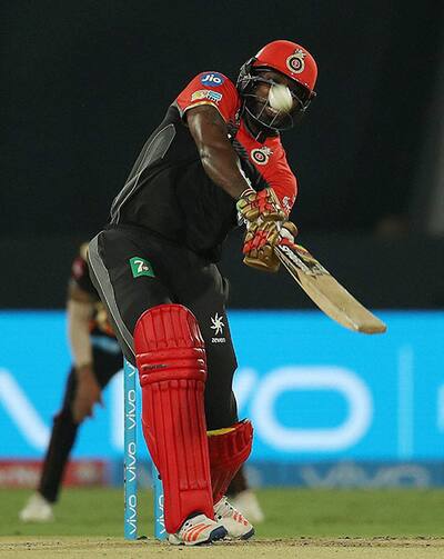 Chris Gayle hits a six during the first match of IPL 2017